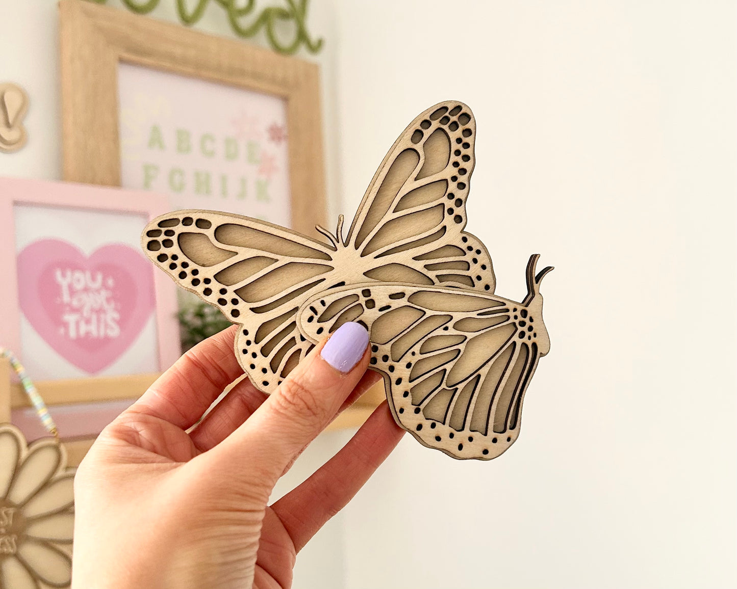 Set of 2 Butterfly wall art, one with open wings and one closed. Perfect for a girls bedroom, playroom or nursery. This kids decor is made from laser cut wood and double layered. In size mini