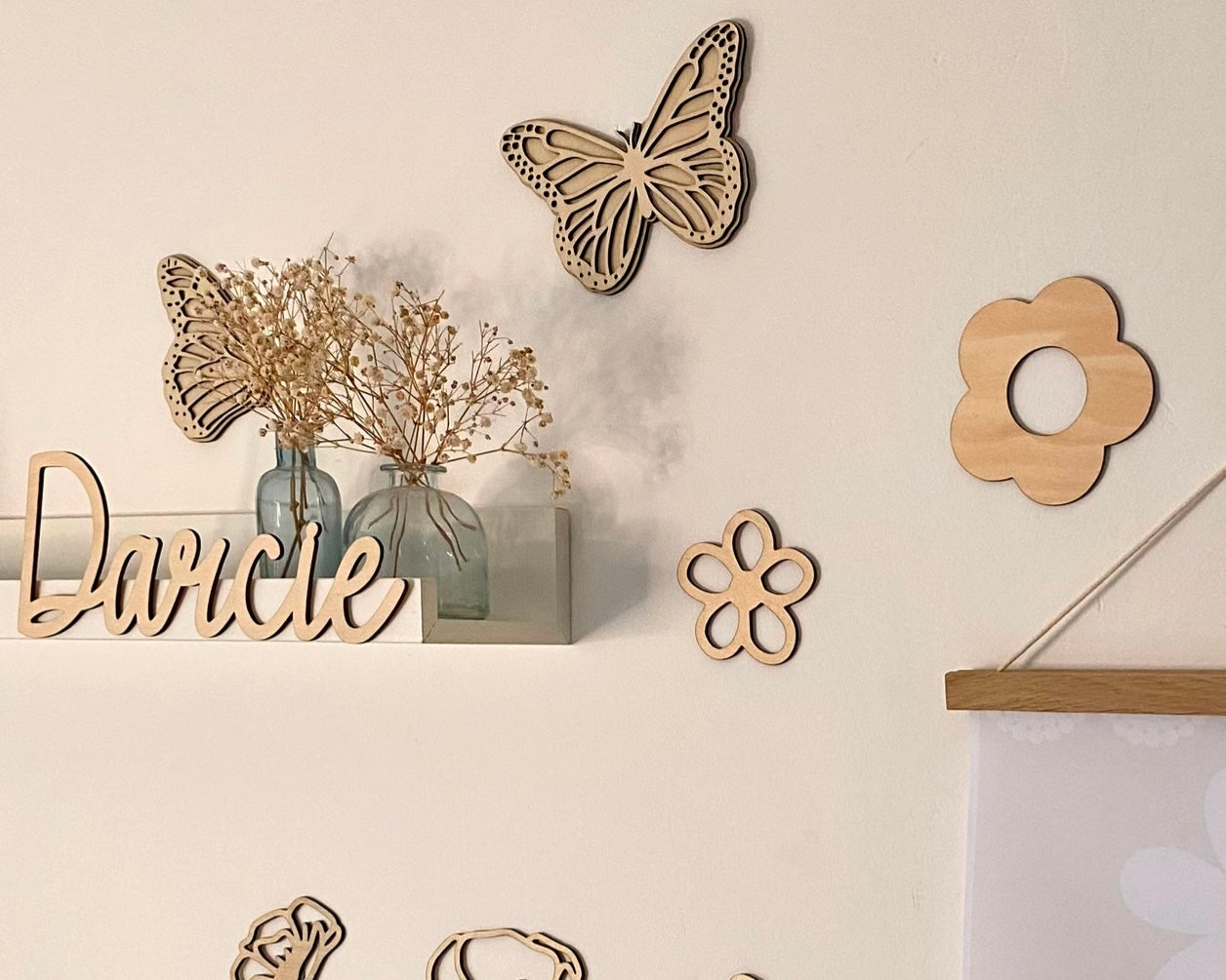 Set of 2 Butterfly wall art, one with open wings and one closed. Perfect for a girls bedroom, playroom or nursery. This kids decor is made from laser cut wood and double layered.